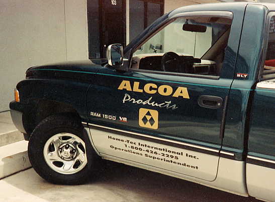 sample of company truck with gold, white and black vinyl lettering